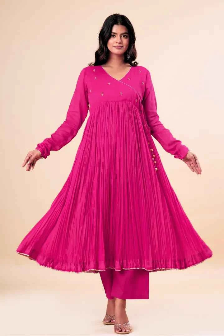 Woman wearing a pink traditional outfit on a beige background